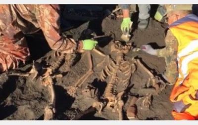 В Харьковской области нашли массовое захоронение солдат